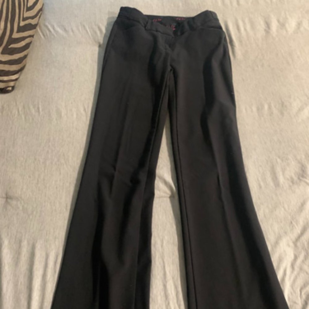 Low waist womans Black pants, never worn, size 0